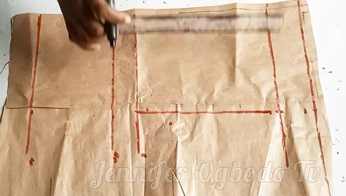 On the waistline, mark waist measurement / 4 + 1 inch.