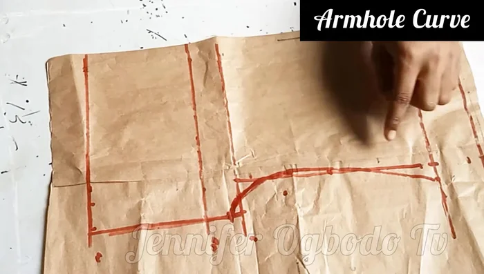 Extend the neckline by 1.5 inches, then curve inward by 0.5 inches for a narrower neckline.