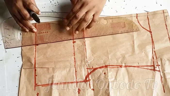 Extend the neckline by 1.5 inches, then curve inward by 0.5 inches for a narrower neckline.