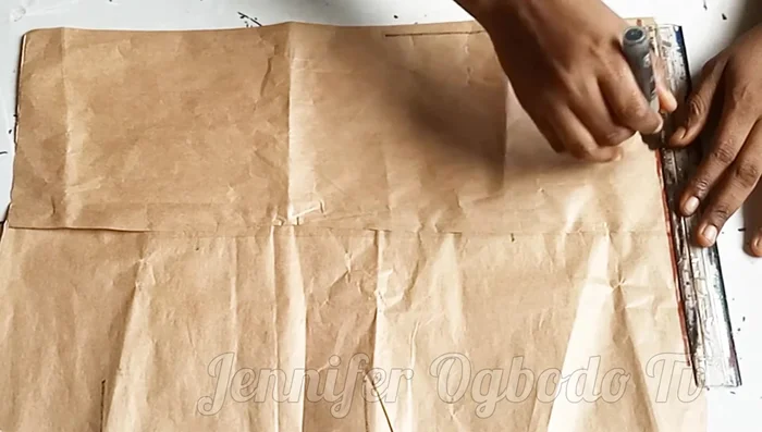 Mark the desired jacket length (e.g., 15 inches) on the starting line.