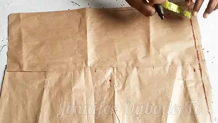 Mark the desired jacket length (e.g., 15 inches) on the starting line.