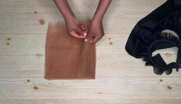 Add the skin-color net layer underneath the circles for added fullness.