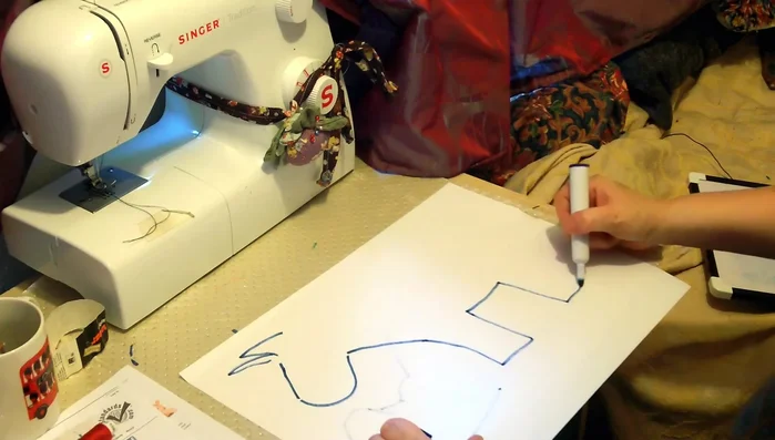 Cut out the unicorn's body, head, ears, horn, legs, and tail pieces. Consider using simple shapes like rectangles and V-shapes as a base.