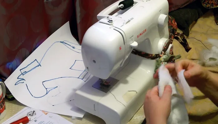 Attach the completed pieces (ears, legs, tail, mane) to the main body of the unicorn, beginning with one side.