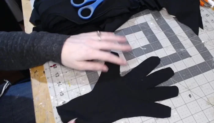 Finish the wrist edge with a quick hem or rolled hem.