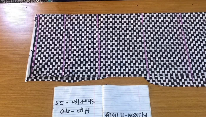 Measure and mark the armhole circumference (9 inches in this example) on the cap sleeve line.