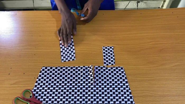 Attach the placket to the larger side of the slit, aligning the bottom with the sleeve bottom, and stitch.