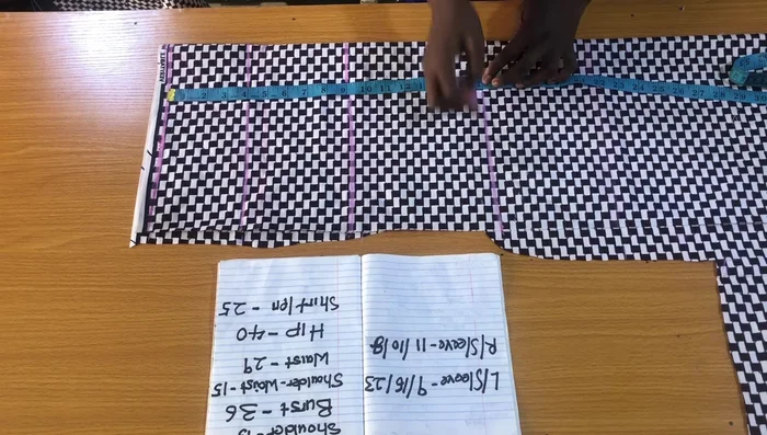 Measure and mark the armhole circumference (9 inches in this example) on the cap sleeve line.