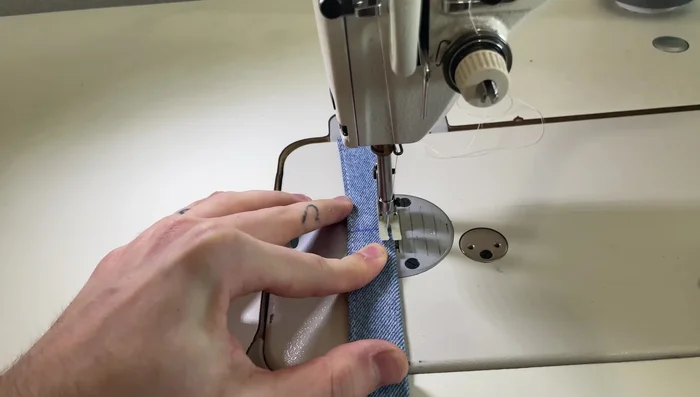 Sew the closed side: Sew the outer areas of the closed side, starting and ending at the ⅛ inch marks, stopping one stitch before/past the marked lines to create a clean finish.