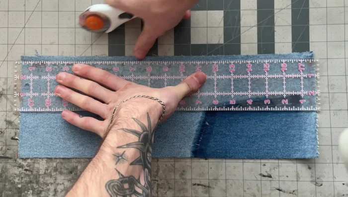 Prepare fabric edges: Mark ½ inch from the edge on the wrong side of the fabric. Apply glue within this area and fold the edges up to the lines, creating a ¼-inch fold.