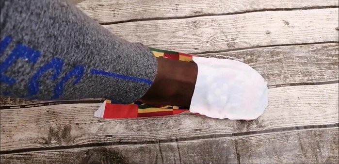 Try on the sock and adjust the fit by pinning and resewing any excess fabric.