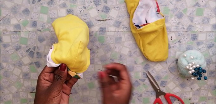 Insert elastic into the cuff and sew the gap closed.