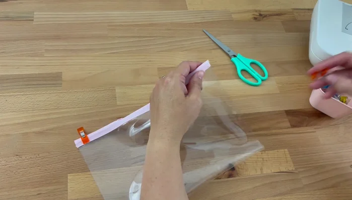 Sew the side seams: Sew along both side edges of the pouch. 