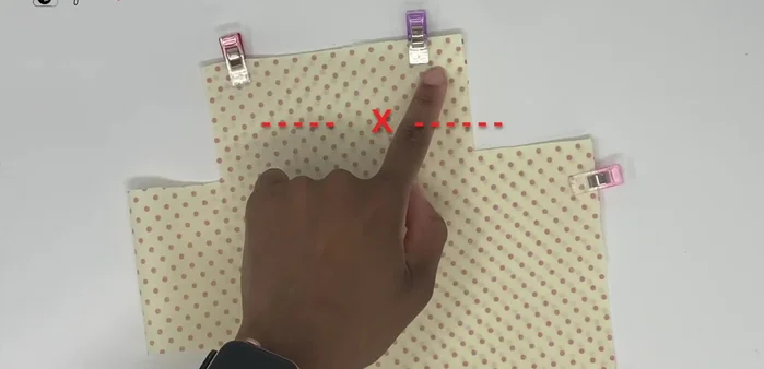 Sew the edges of the lining fabric together, leaving a small gap at the bottom for turning. Press the seams.