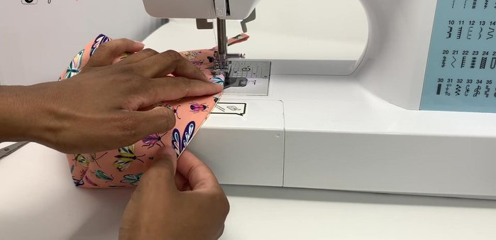 Top stitch along the edge and close the gap in the lining. Give the storage pot a final press.