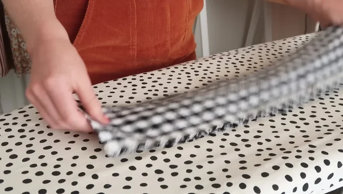 Stitch the waistband in place, enclosing the raw edges. Leave a small opening for elastic threading.