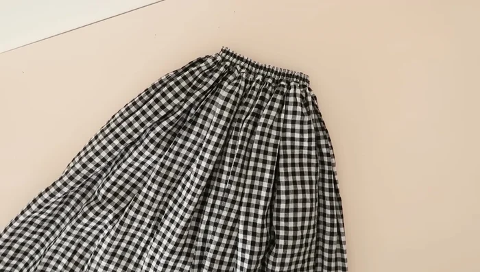 Remove gathering and basting stitches.