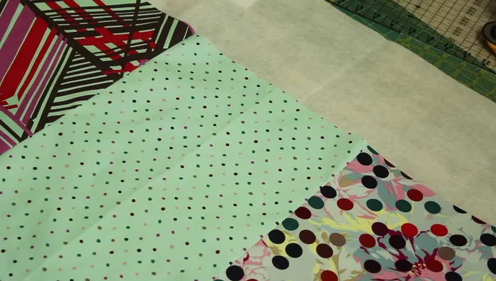 Fuse fleece to fabric: Place the fusible fleece (adhesive side up), lay the fabric on top, and fuse using an iron. Trim excess fleece.