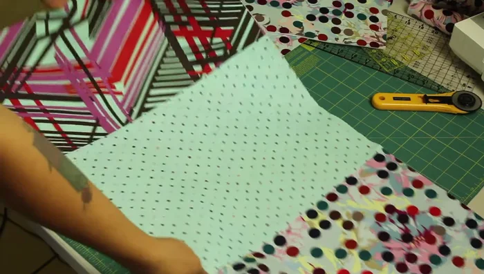 Optional: Quilt the main body piece with decorative stitches.