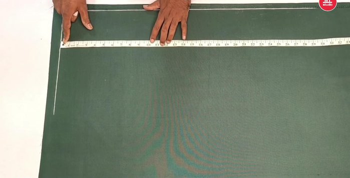 Mark the collar measurement (16.5 inches). Divide the neck measurement by 5 and add 1.25 inches.