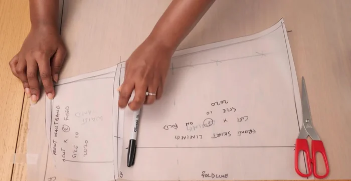 Trace and cut the waistband pattern piece, adding seam allowance (except on the center front edge). Cut two pairs.