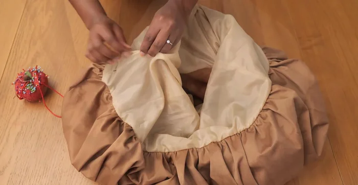 Pin close the lining opening and top stitch.