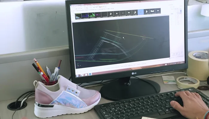 Sample Making: Creating a one-off sample based on the laser-cut pieces and designer's information.