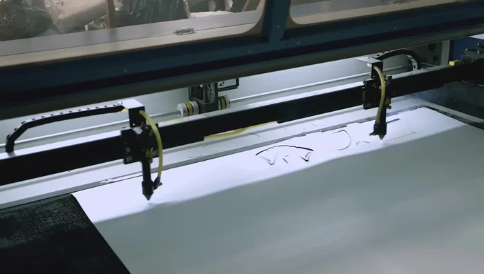 Sample Making: Creating a one-off sample based on the laser-cut pieces and designer's information.