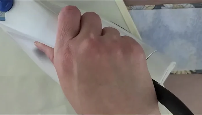 Iron the fleece onto the wrong side of one fabric piece using medium heat and a pressing cloth.