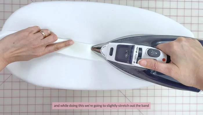 Stay stitch the seam allowances of one side of the waistband (about 1.2 cm from the edge). Fold seam allowances up to the wrong side and press.