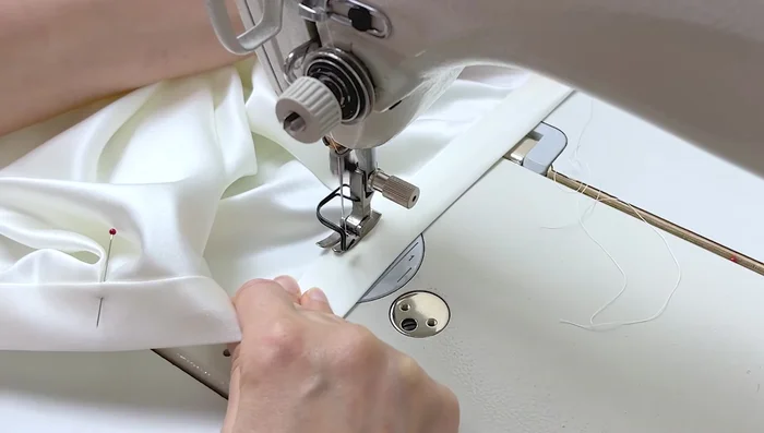 Top stitch the waistband 1mm from the folded edge. Press.