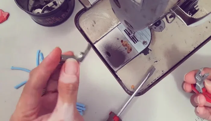 Sew the loops onto the zipper tape. Use tweezers to manipulate the loops if needed.