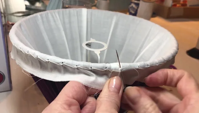 Avoid stitching into the top of the ring if stitches are to be hidden. Place stitches to the front of the frame.