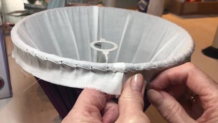 Avoid stitching into the top of the ring if stitches are to be hidden. Place stitches to the front of the frame.