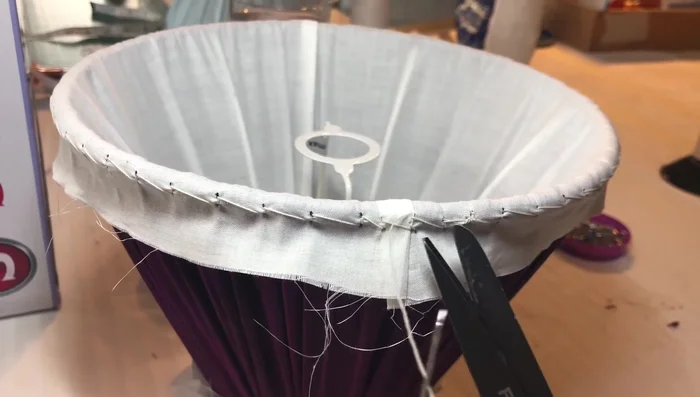 Add an extra back stitch and loop through to secure. Tidy your thread under your work before cutting.