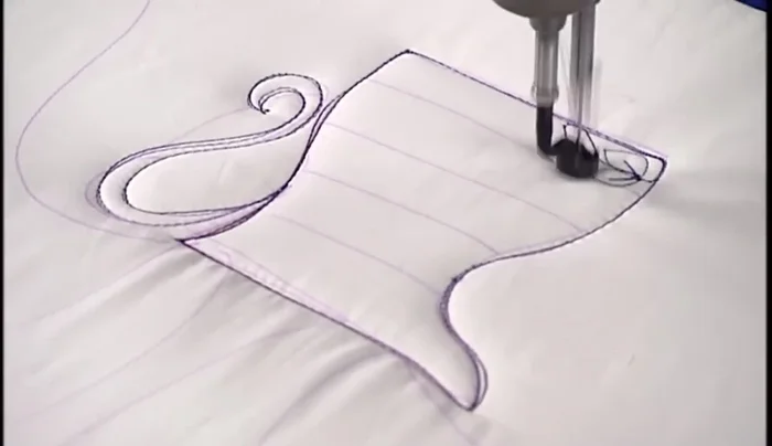 Decorate the pot: Add leaves and stems inside the pot using simple stitching.