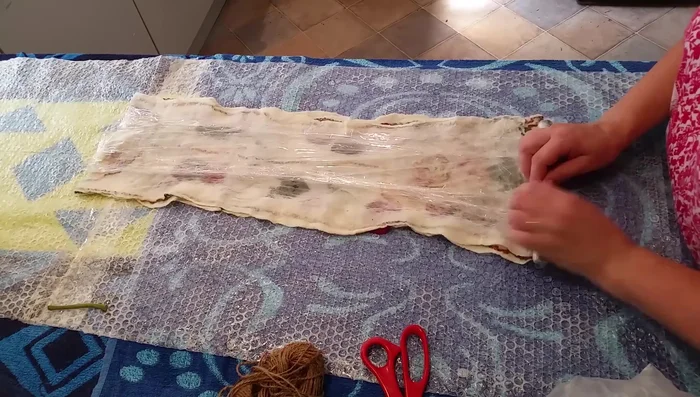 Unbundle and admire the eco-printed design.