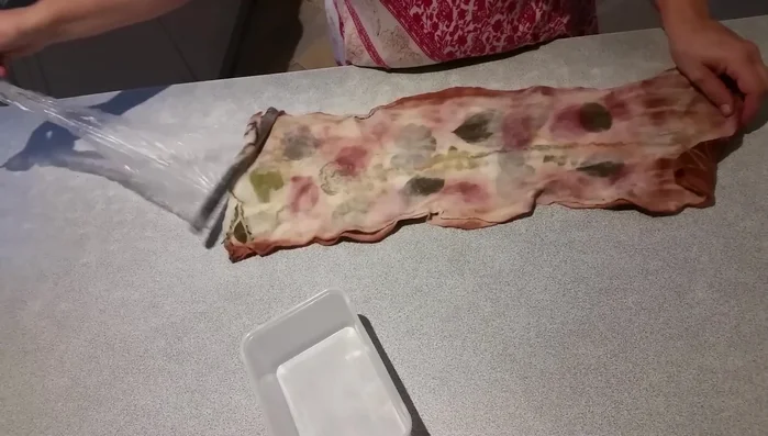 Unbundle and admire the eco-printed design.