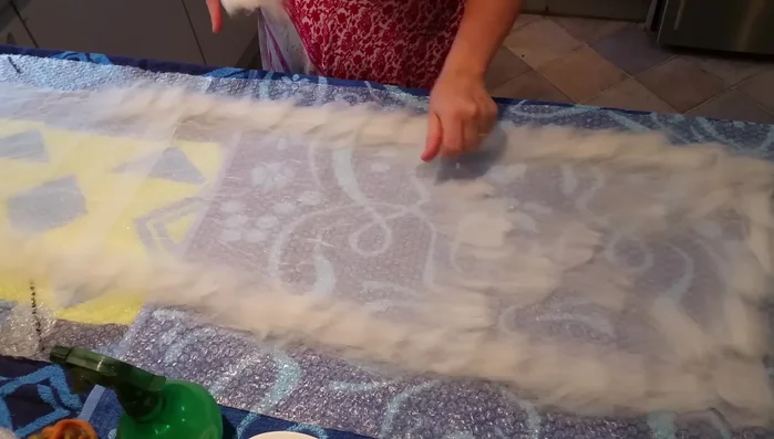 Add small wisps of wool over silk areas to act as glue during felting.