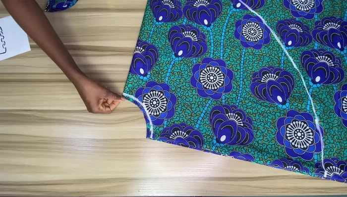 Cut out the skirt: Cut along the marked lines, adding a half-inch seam allowance to the top of the waistline.