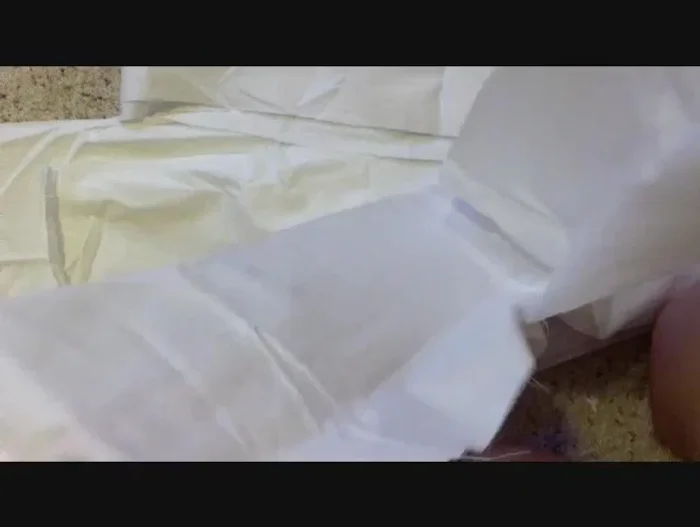 Sew the strips together in sets of two. Remove the existing stitches from the sewn parts of your sheets and sew the two strips together.