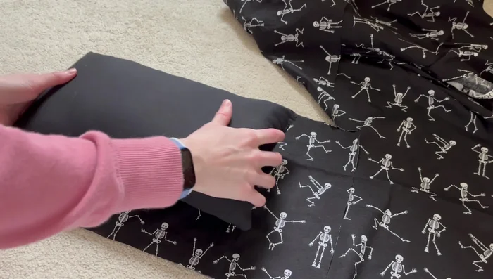 Cut out two additional pieces for handles. These are made from the excess fabric from the pillow cover.