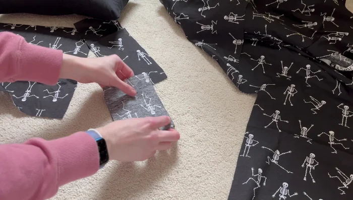 Cut out two additional pieces for handles. These are made from the excess fabric from the pillow cover.