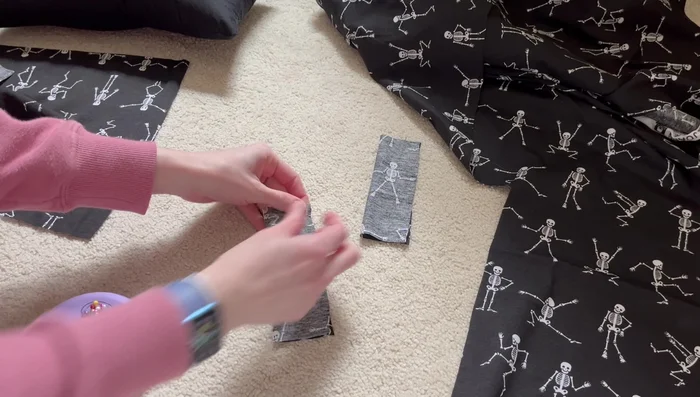 Fold the handle pieces in half, right sides together, and sew along the long edge. Repeat for the second handle.