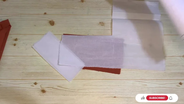 Fold and iron the interfaced band pieces.