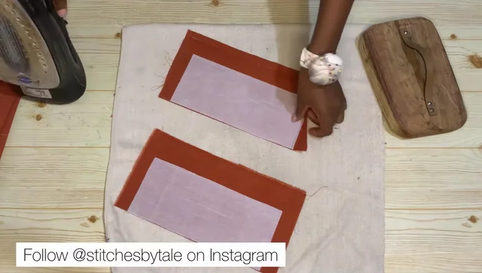 Fold and iron the interfaced band pieces.