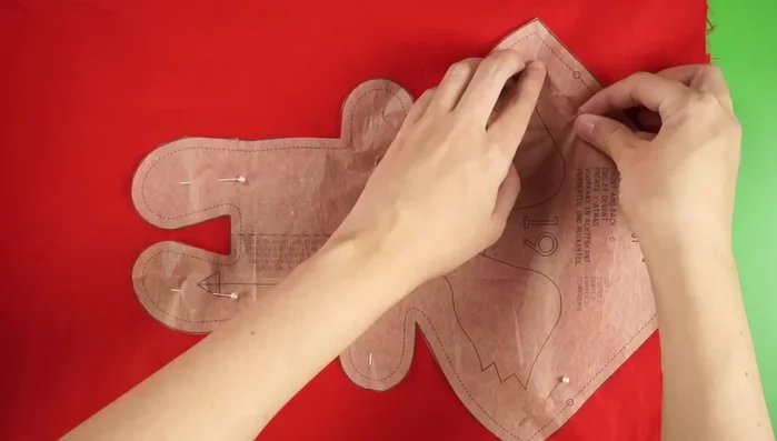 Cut fabric: Fold your cotton fabrics in half with right sides together. Pin and cut the fox's body and ears according to the pattern and guide sheet.