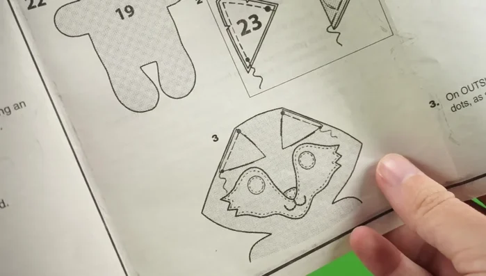 Sew ears: Sew the ears together, leaving the edge with the large and small dots open. Clip notches and turn right side out.