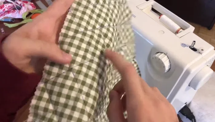 Iron Fabric: Iron the fabric to remove the pen markings.