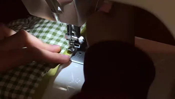 Sew Zipper: Use a zipper foot to sew the zipper onto the fabric, keeping the stitching close to the zipper teeth.